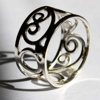 Brocéliande, bague celte avec volutes et spirales en argent